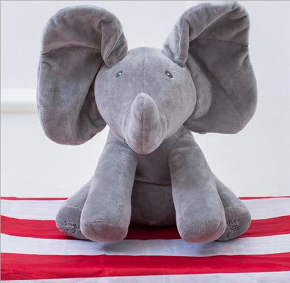 Interactive Elephant Cuddle Buddy - watch how he sings and dances! - Bump2Crib